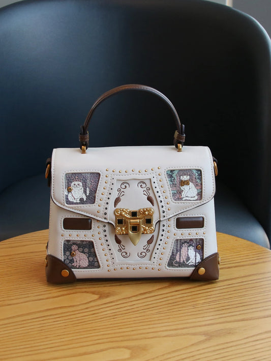 Niche Design Advanced Texture Rivet Box Bag 2026 Fashion New Luxury Western Ladies Portable Small Bag Cat Pattern Heavy Industry Hardware Retro Color Matching One-Shoulder Crossbody Bag